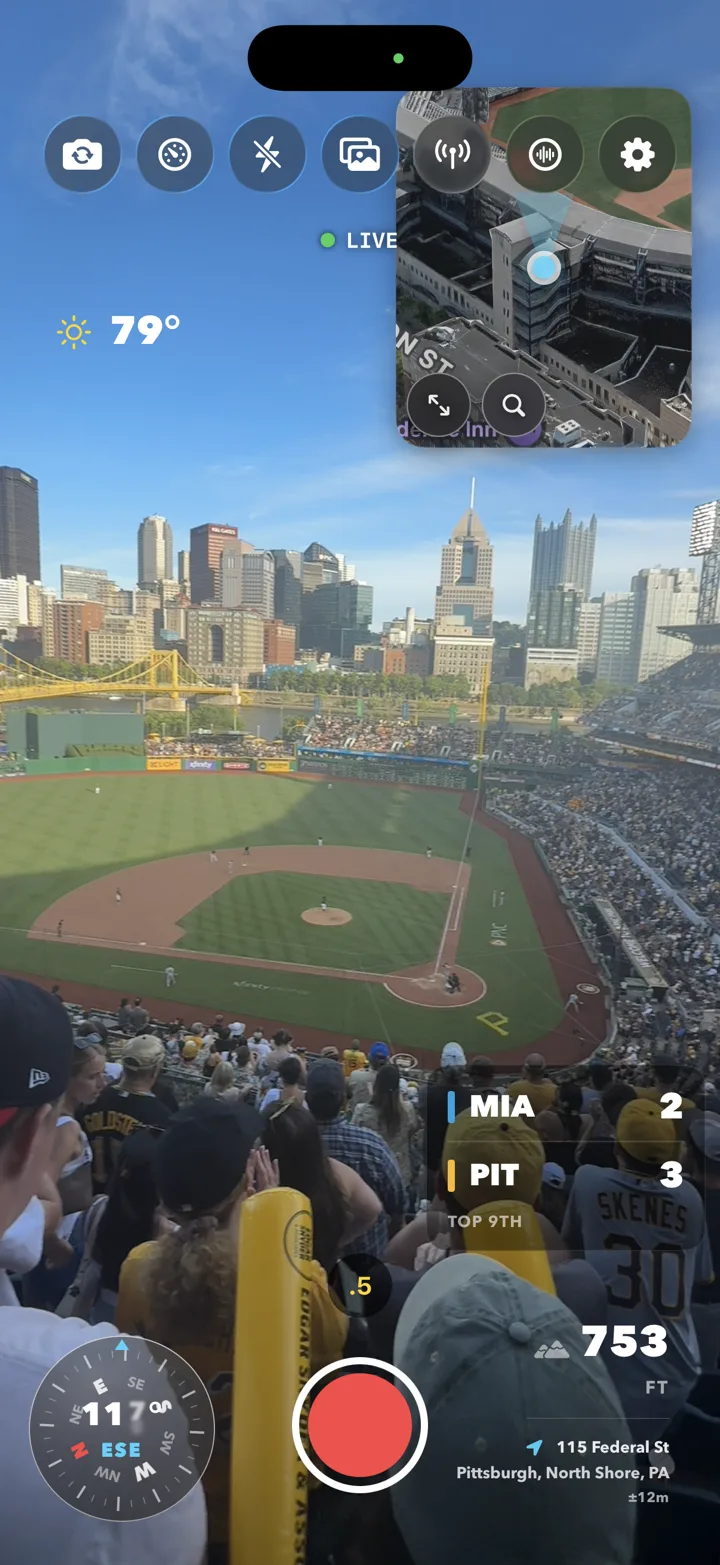 AtlasCam camera view from the stands at a Pirates ballgame with a live scorebug reading MIA 2, PIT 3, top of the 9th, alongside weather, compass, altitude, and location overlays